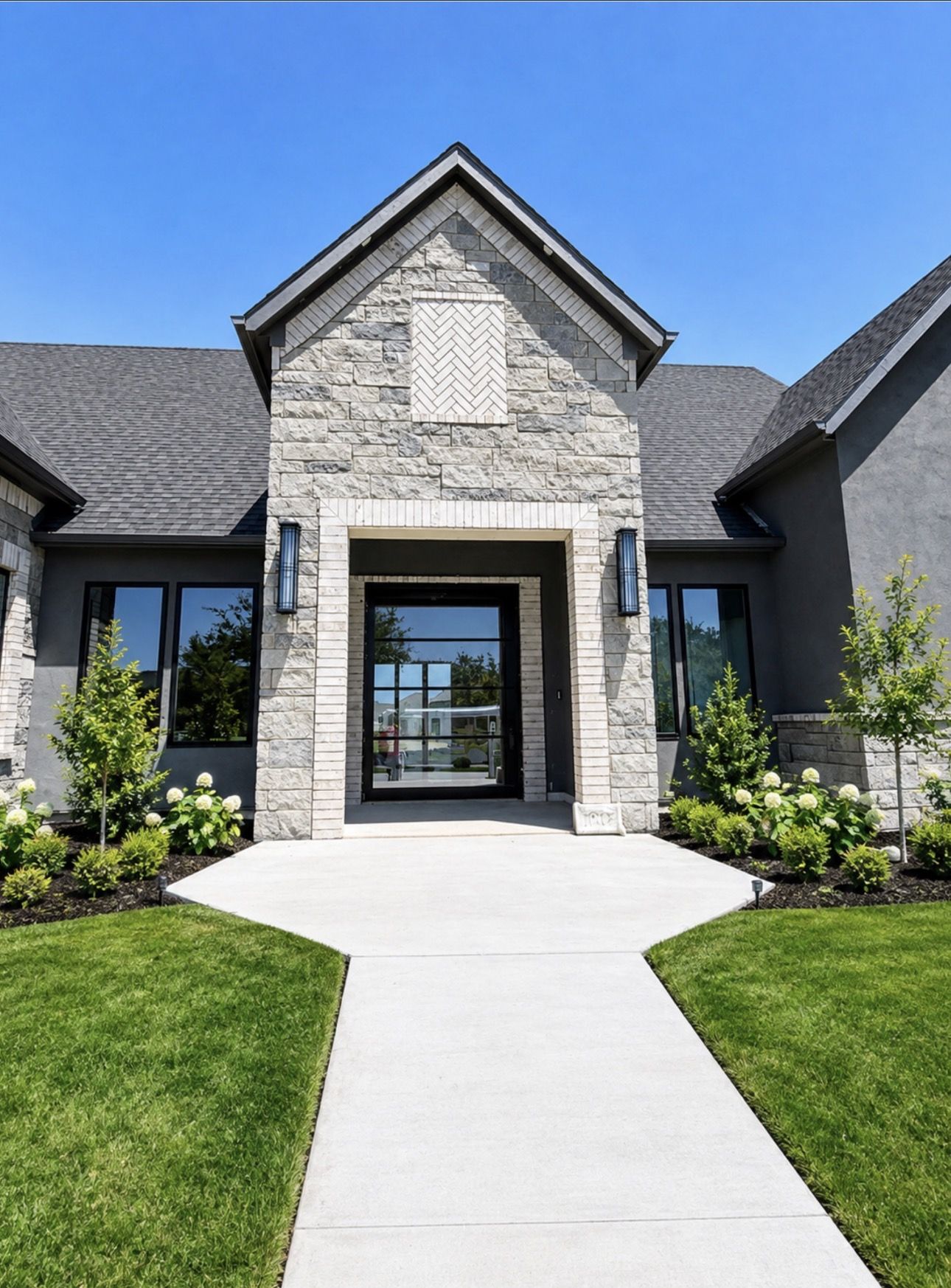 Stone entry with herringbone detail